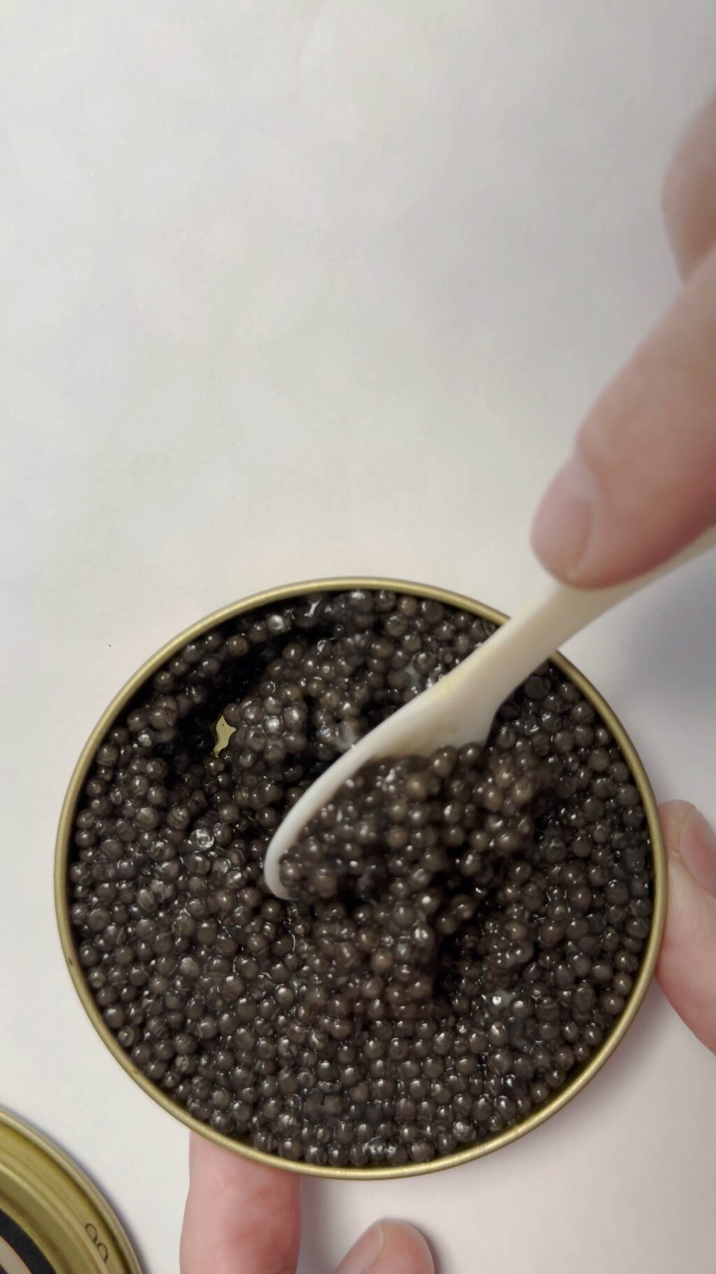 Opening a tin of caviar – London Caviar House product July 2025